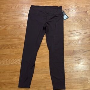 Never worn large plum colored yoga pants